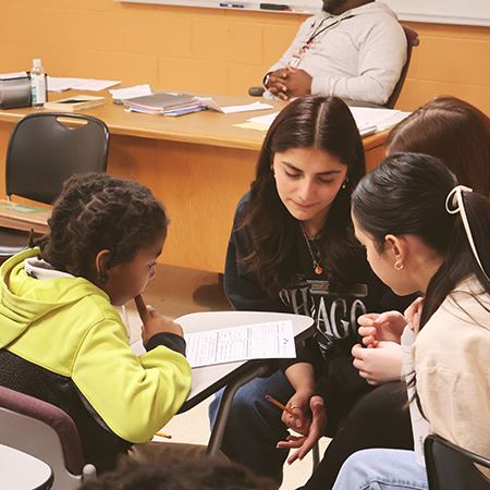 Volunteer tutoring young children