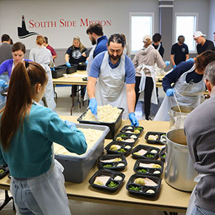 South Side Mission volunteers preparing meals